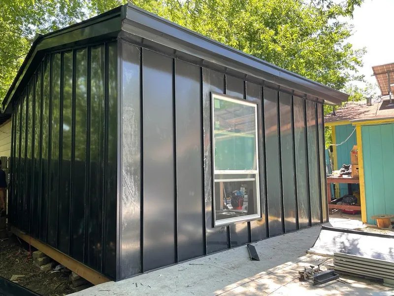 Black standing seam metal wall panels for Metal Roof Installation in Dakota Ridge