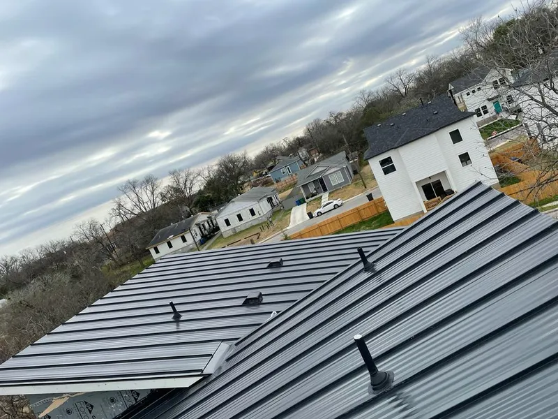 Standing seam metal roof panels with vents for Skylight Repair in Dakota Ridge